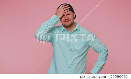 Young man waiting for good luck, loses becoming surprised sudden lottery results, bad fortune loss Young man waiting for good luck, loses becoming surprised sudden lottery results, bad fortune loss 90090082