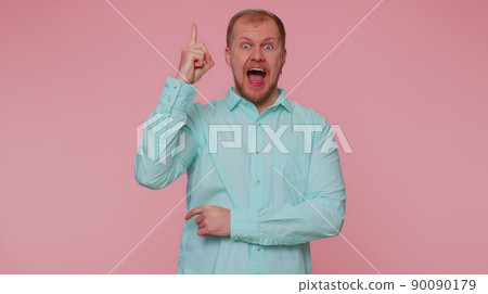 Inspired adult man pointing finger up, showing Eureka gesture, solution, idea, inspiration, answer Inspired adult man pointing finger up, showing Eureka gesture, solution, idea, inspiration, answer 90090179