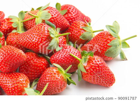 Bunch of fresh strawberries on a white background Bunch of fresh strawberries on a white background 90091787