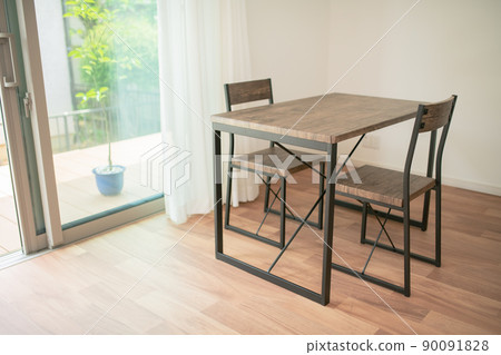 A table by a bright window A table by a bright window 90091828