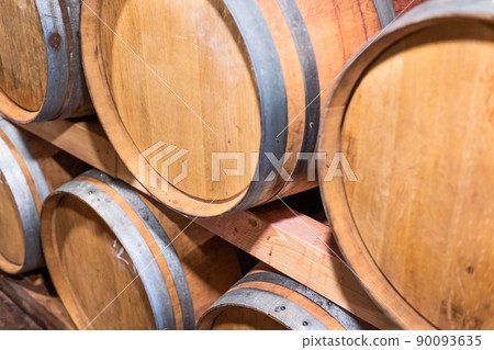 A wine cellar full of barrels of wine, alcohol concept 90093635