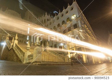 Night streets with car lights trails in City of Guanajuato, Mexico Night streets with car lights trails in City of Guanajuato, Mexico 90094523