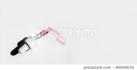 Pipette with fluid hyaluronic acid on white background. Cosmetics and healthcare concept closeup. Dose of serum, retinol with air bubbles. Flat lay. Beauty product presentation, macro Pipette with fluid hyaluronic acid on white background. Cosmetics and healthcare concept closeup. Dose of serum, retinol with air bubbles. Flat lay. Beauty product presentation, macro 90094650