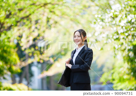 Young lady in recruit suit 90094731