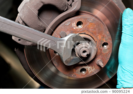 Mechanic car service auto garage in automotive mobile center. Technician workshop repair engine motor. 90095224