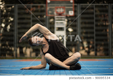 Beautiful man doing work out and different exercises outdoor 90095534