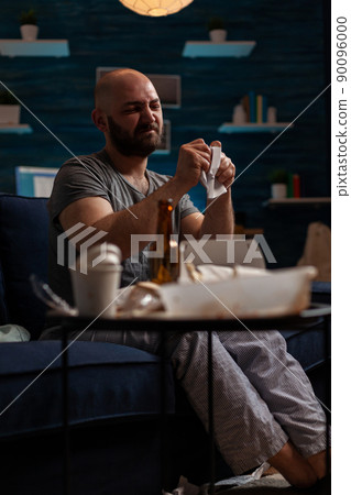 Frustrated man with depression breaking eviction notice paper, worrying about mortgage payment and taxes bill warning. Angry irritated person feeling worried about financial difficulties. Frustrated man with depression breaking eviction notice paper, worrying about mortgage payment and taxes bill warning. Angry irritated person feeling worried about financial difficulties. 90096000