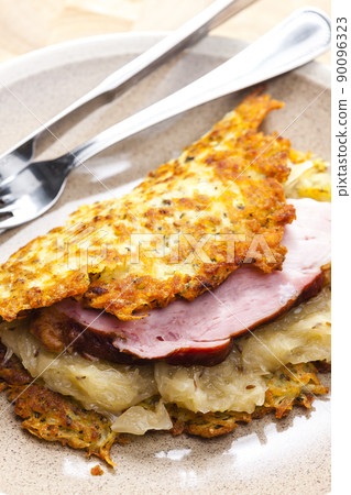 potato cakes with smoked meat and sour cabbage 90096323