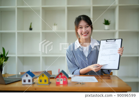 Portrait real estate agent adviser show contract agreement on workplace 90096599