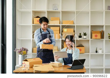 Shot of Young couple entrepreneur, start up teenager business SME owner work at home. 90096622