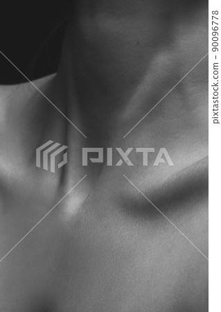 Close up female neck, collarbones. Beautiful woman with well-kept skin. Natural beauty, fitness, diet, spa, plastic surgery and aesthetic cosmetology Close up female neck, collarbones. Beautiful woman with well-kept skin. Natural beauty, fitness, diet, spa, plastic surgery and aesthetic cosmetology 90096778