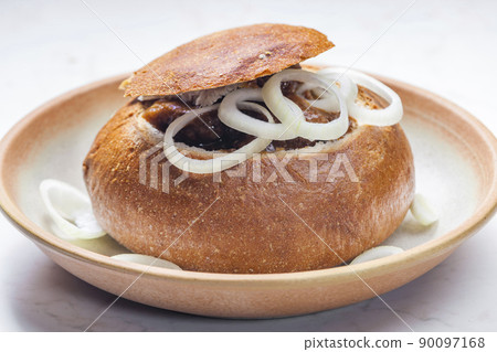 beef goulash in loaf of bread beef goulash in loaf of bread 90097168