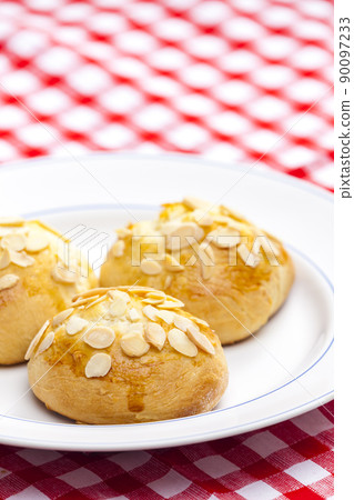 still lif of almond buns still lif of almond buns 90097233