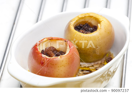 sweet apples baked with raisins sweet apples baked with raisins 90097237