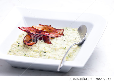 zucchini soup with bacon strips zucchini soup with bacon strips 90097238