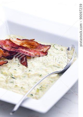 zucchini soup with bacon strips zucchini soup with bacon strips 90097239