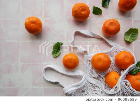 Fresh tangerines in a netted bag, Stock image