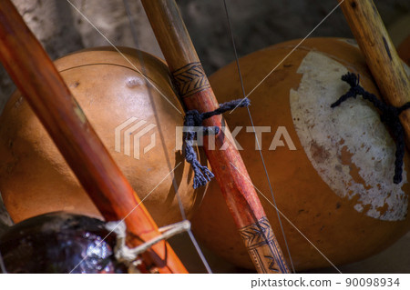 Detail of musical instrument called berimbau Detail of musical instrument called berimbau 90098934