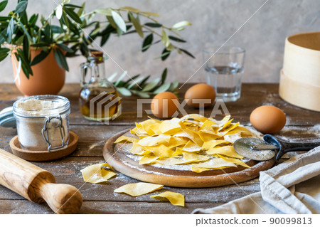 Homemade pasta Maltagliati with ingredients in rustic style 90099813