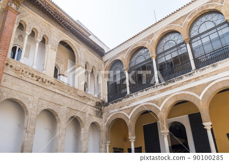 Royal Alcazar of Seville, a walled palatial complex built in different historical stages. Royal Alcazar of Seville, a walled palatial complex built in different historical stages. 90100285