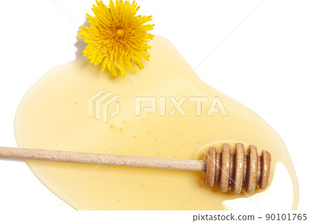 Wooden dipper with honey and dandelion isolated on a white background. Golden organic floral honey natural. Wooden dipper with honey and dandelion isolated on a white background. Golden organic floral honey natural. 90101765