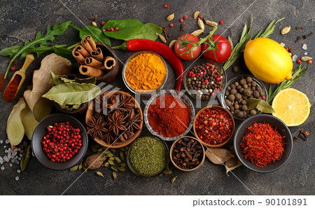 Herbs and spices in metal bowls. Food and cuisine ingredients. Colorful natural additives. Herbs and spices in metal bowls. Food and cuisine ingredients. Colorful natural additives. 90101891