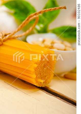 Italian traditional basil pesto pasta ingredients 90102486