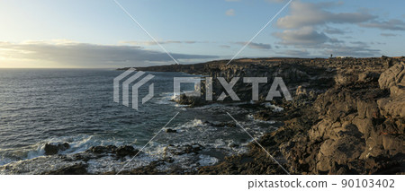 Panoramic view of volcanic landscape on the coast of Lanzarote, Canary Islands, Spain. 90103402