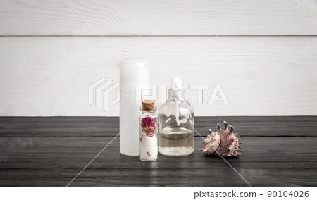 Spa beauty cosmetic products on white and black wooden background. Copyspace 90104026