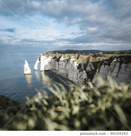 Coastal landscape along the Falaise d'Aval the famous white cliffs of Etretat village Coastal landscape along the Falaise d'Aval the famous white cliffs of Etretat village 90104293