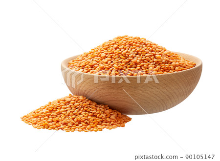 red lentils in a wooden bowl isolated on white background. red lentils in a wooden bowl isolated on white background. 90105147