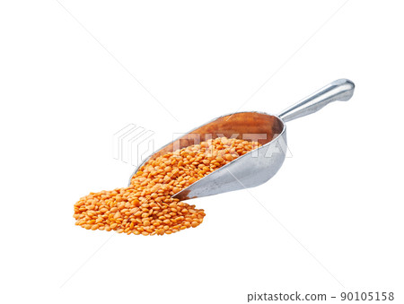 Small metal spoon or scoop with red lentils seen isolated on white background. Small metal spoon or scoop with red lentils seen isolated on white background. 90105158