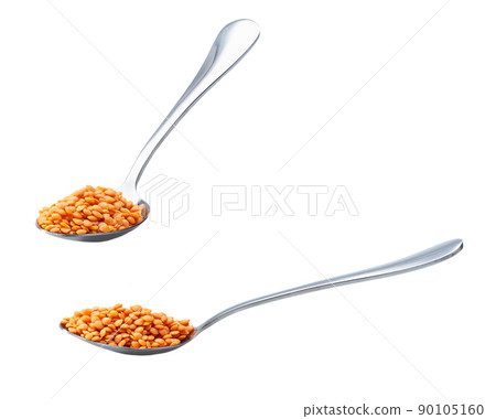 metal spoon with red lentils isolated on white background. metal spoon with red lentils isolated on white background. 90105160
