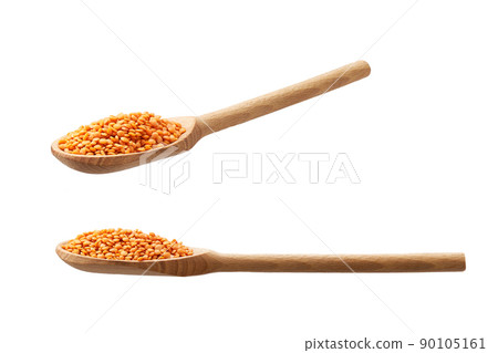 wooden spoon with red lentils isolated on white background. wooden spoon with red lentils isolated on white background. 90105161