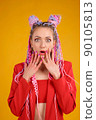 Funny young woman portrait with emotion of surprising and wondering. 90105813