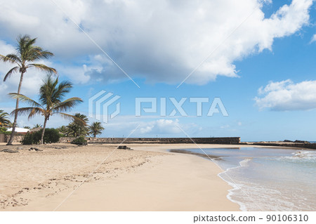 Sunny beach in, costa Teguise, Lanzarote, Canary Islands, Spain. Sunny beach in, costa Teguise, Lanzarote, Canary Islands, Spain. 90106310