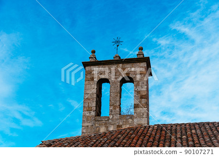 Bell tower of a medieval stone church in the historic town of Atienza 90107271
