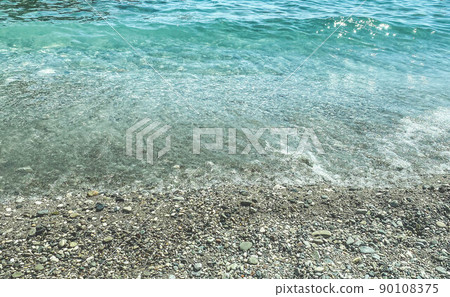 stones on the beach. pebble beach, seaside vacation, travel to a hot and warm country. texture with stones. next to the beach water, sea wave stones on the beach. pebble beach, seaside vacation, travel to a hot and warm country. texture with stones. next to the beach water, sea wave 90108375