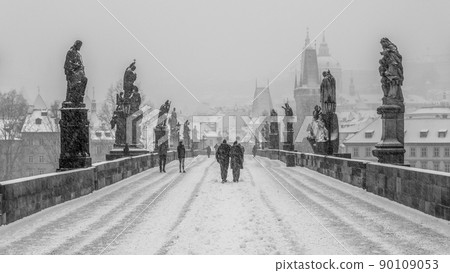 Snow storm on Charles Bridge in Prague Snow storm on Charles Bridge in Prague 90109053