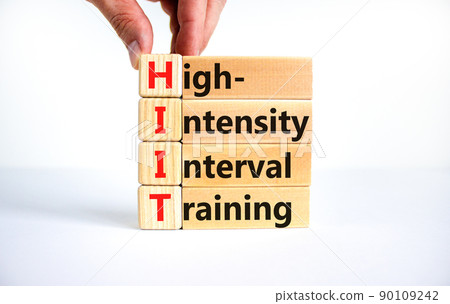 HIIT high-intensity interval training symbol. Concept words HIIT high-intensity interval training on blocks on a beautiful white background. HIIT high-intensity interval training concept. Copy space. 90109242