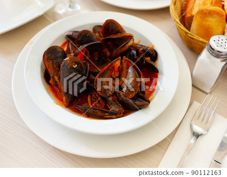 Popular dish of mussels a la Marinera Popular dish of mussels a la Marinera 90112163