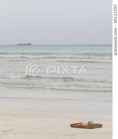 Emerald sea color, sandy beach Delicious baguette bread Emerald sea color, sandy beach Delicious baguette bread 90112397