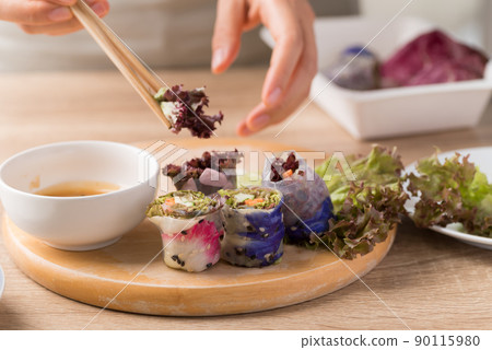 Fresh spring roll with flower and vegetable, Vegan food cooking 90115980