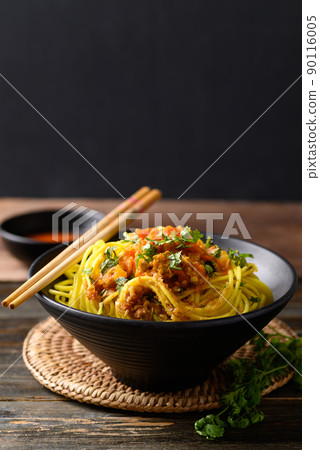 Noodle mixed with spicy tomatoes sauce, Tai Yai food in Northern of Thailand 90116005