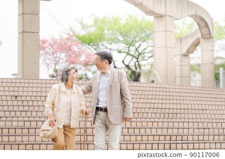 Up and down stairs senior couple 90117006