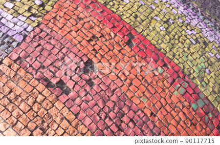 Beautiful multicolored background of old mosaic on the wall, multicolored little pebbles Beautiful multicolored background of old mosaic on the wall, multicolored little pebbles 90117715
