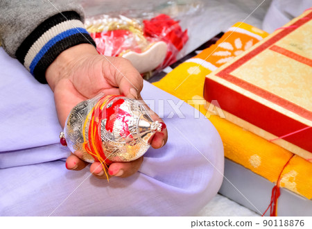 Hindu wedding ceremony. Details of traditional indian wedding. Beautifully decorated hindu wedding accessories. Indian marriage traditions. Hindu wedding ceremony. Details of traditional indian wedding. Beautifully decorated hindu wedding accessories. Indian marriage traditions. 90118876