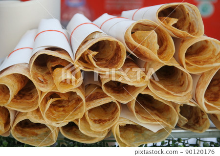 Pile of crispy roti. 90120176