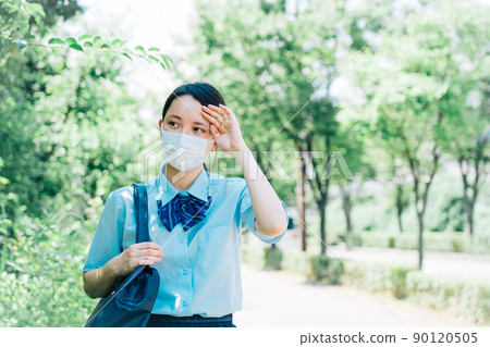 High school students wearing masks to go to school High school students wearing masks to go to school 90120505
