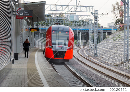 MOSCOW, RUSSIA - SEPTEMBER 13, 2016: Central Circle Line MCC Lastochka train at the station Krimskaya 90120551